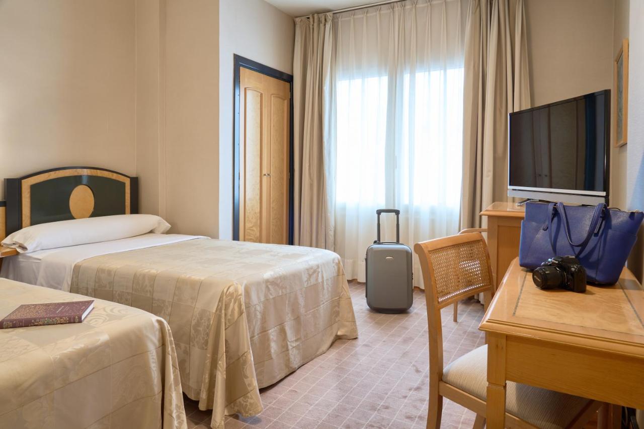 Habitación Doble con cama supletoria - 1 o 2 camas (2 adultos + 1 niño)